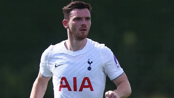 Andrew Robertson in a Tottenham Hotspur shirt
